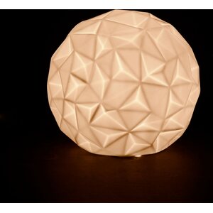 Cote Table A white light ball with a matte surface